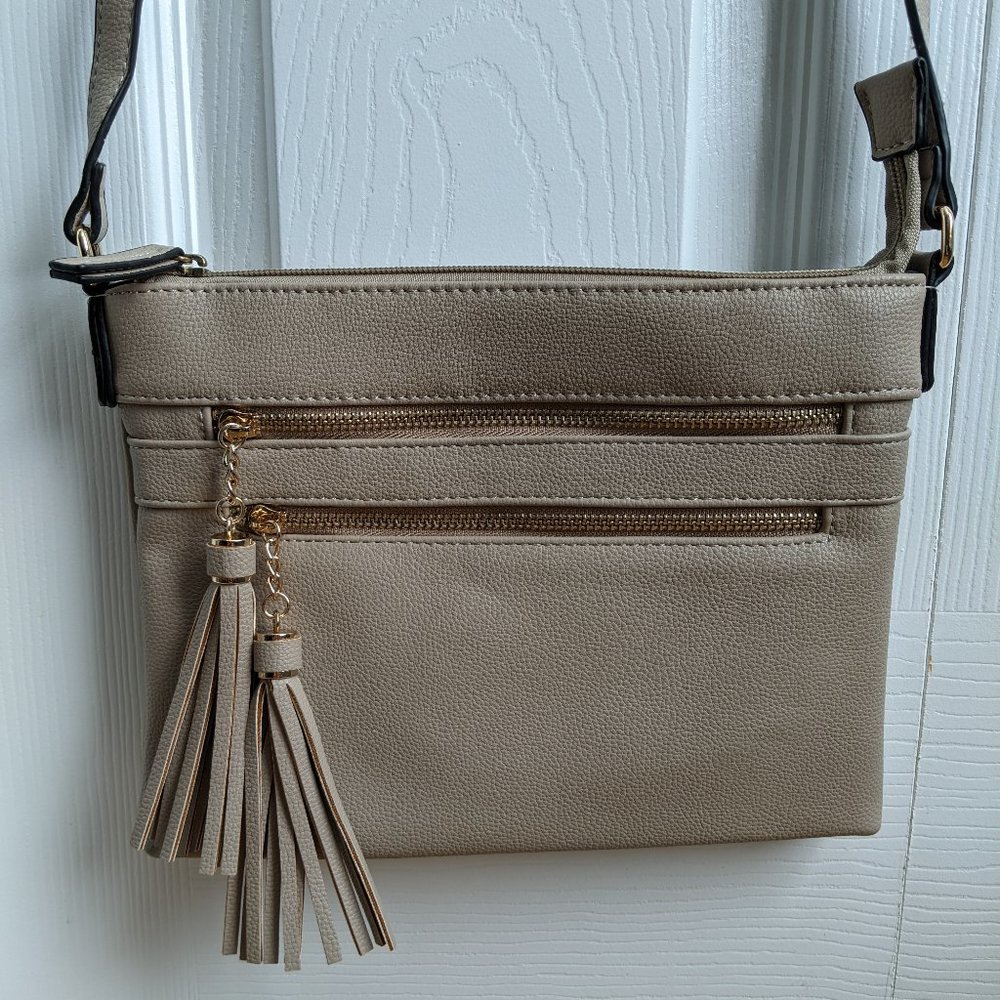 Like-new beige tan crossbody purse bag